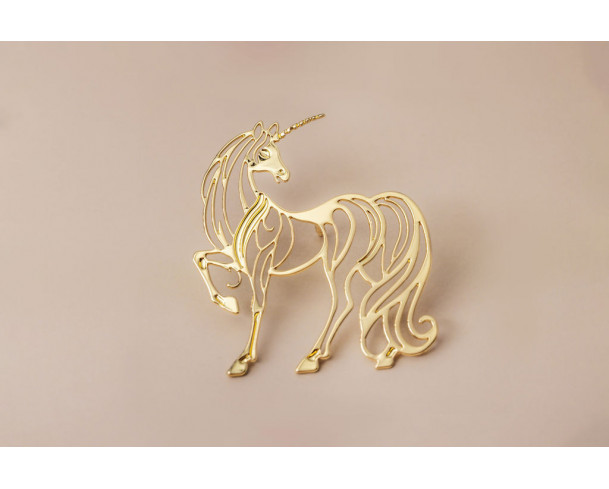 Pin’s licorne dorée – Impact Émotion