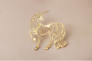 Pin’s licorne dorée – Impact Émotion