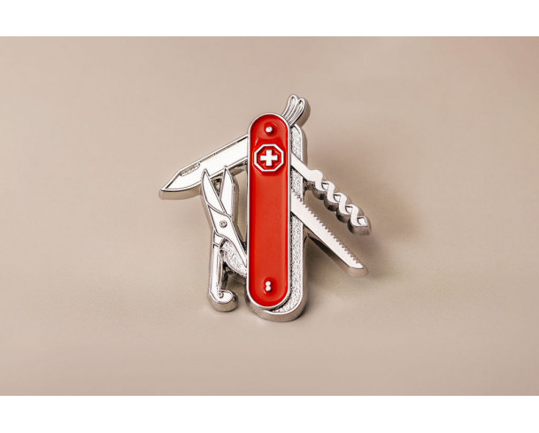 Pin’s couteau suisse en métal argenté et rouge – Impact Émotion