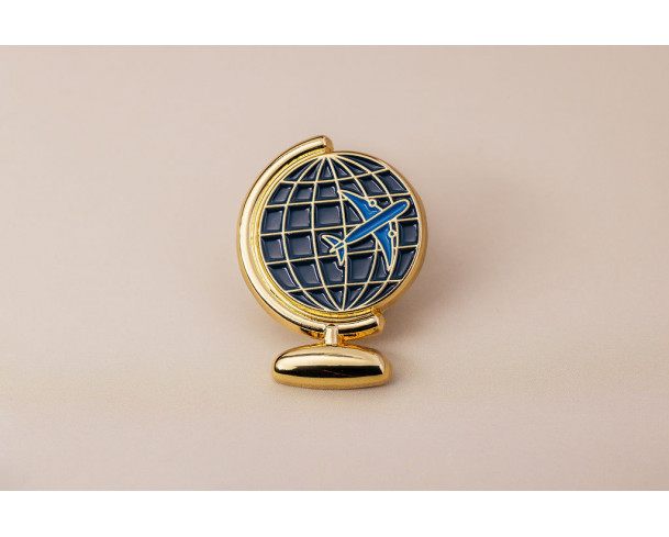 Pin’s globe terrestre – Impact Émotion