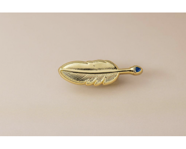 Pin's plume dorée – Impact Émotion