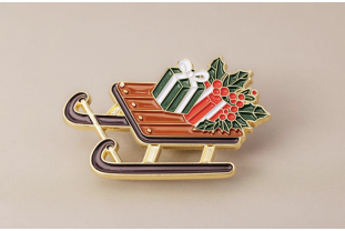 Pin’s traîneau de Noël – Impact Émotion