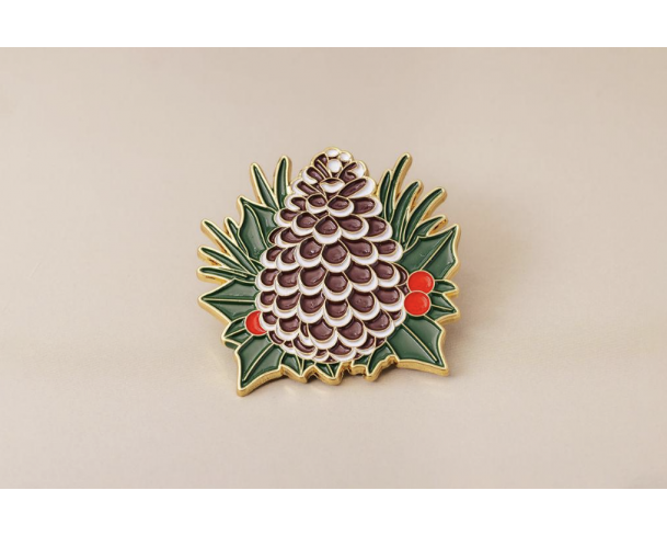 Pin’s pomme de pin doré – Impact Émotion