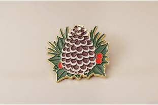 Pin’s pomme de pin doré – Impact Émotion