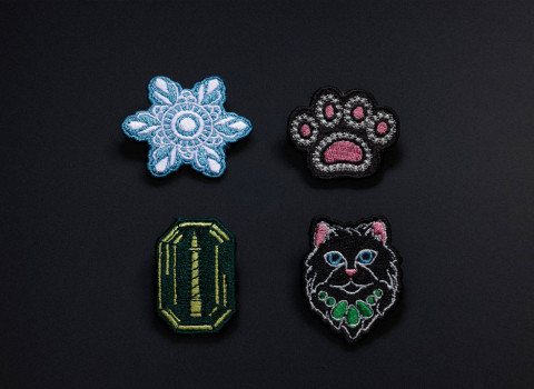 Gamme exclusive de broches brodées