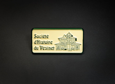 Pin's de finition vert métallisée